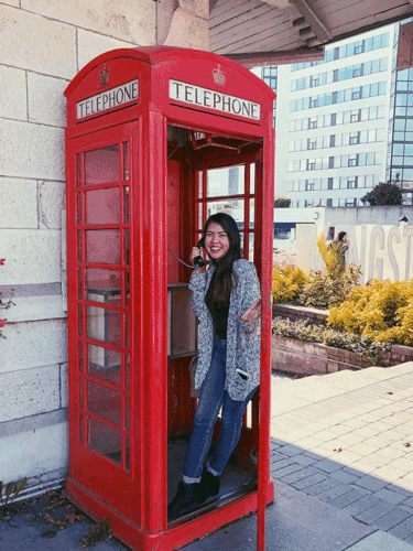 Pauline on the old phone booth